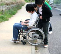 Exercise in providing assistance to wheelchair users